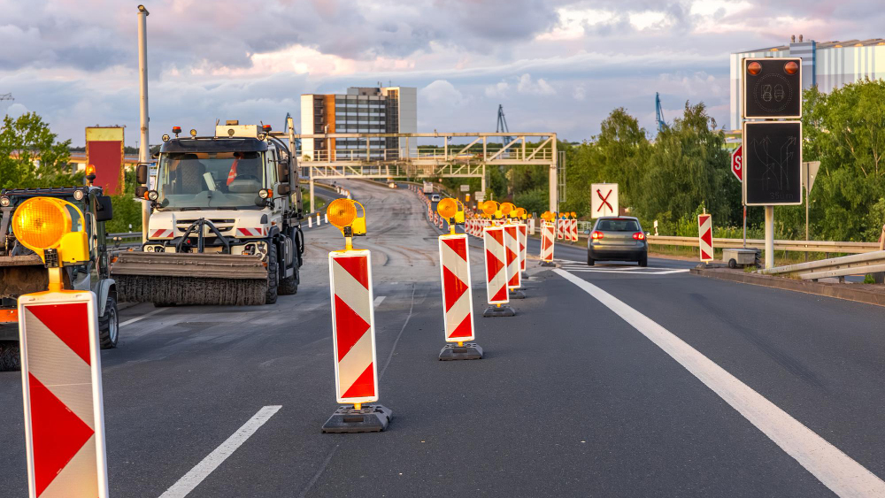 an image of a construction zone accident and work being done
